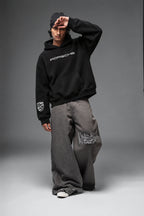 Front view of the Porsche hoodie with the model posing