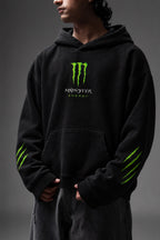 AMARCO MONSTER black oversized hoodie front view with hands near pocket