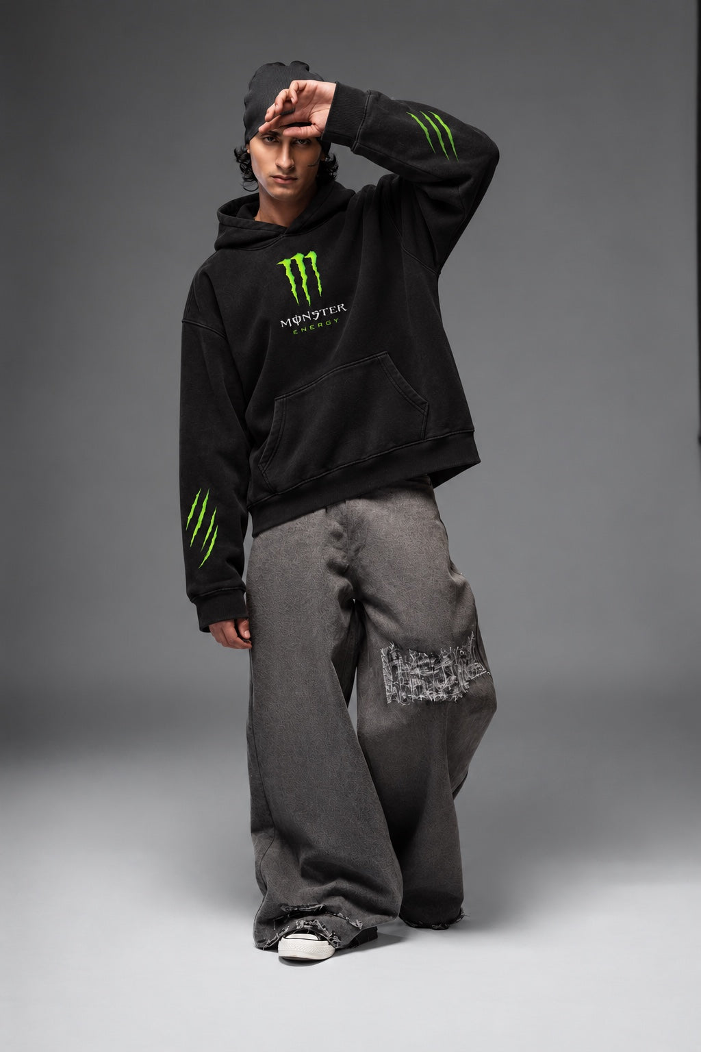 AMARCO MONSTER black oversized hoodie front view with raised arm