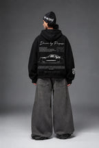 Full-length rear view showing the monochrome Porsche 911 back print