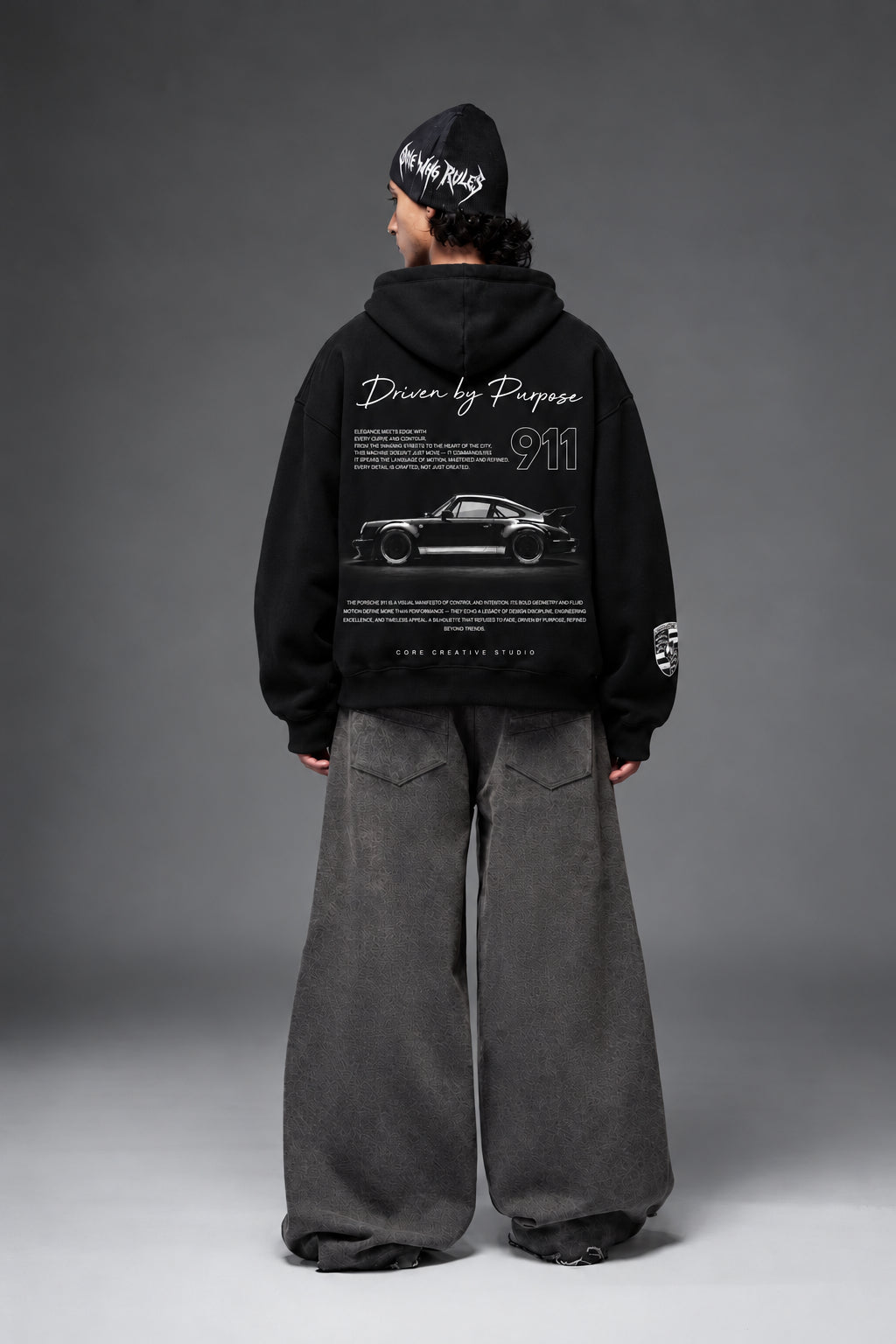 Full-length rear view showing the monochrome Porsche 911 back print