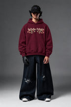 Infinite Petals oversized hoodie in Burgundy – full front view
